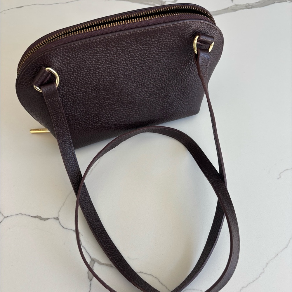 Cuyana Travel Case Pebbled Leather Crossbody in Chocolate Brown with dust cover